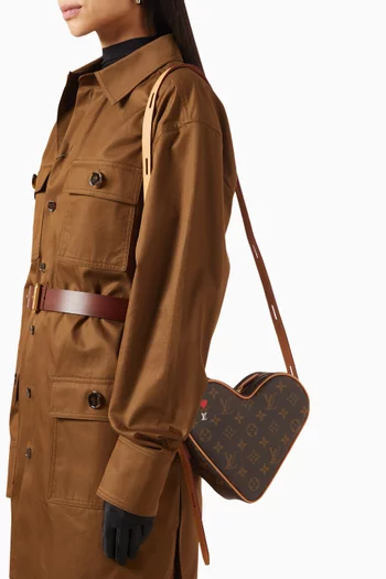 حقيبة جيم اون كور بتصميم قلب بشعار الماركة قنب مُغلف