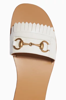 Gucci fringe sale slides