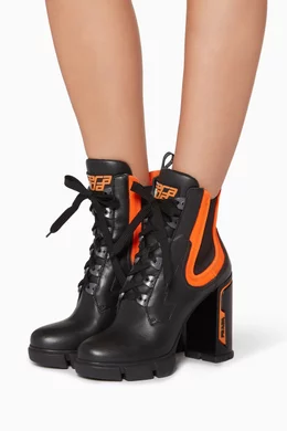 Prada orange and black boots 2025