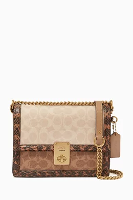 Coated canvas signature block hutton shoulder bag shop