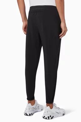 Nike running essential hotsell woven sweatpants in blac