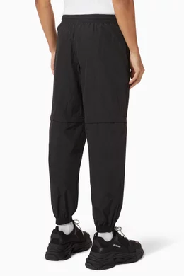 Buy Balenciaga Black Zipped Tracksuit Pants in Crinkled Nylon for Men in UAE Ounass