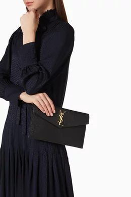 Ysl uptown mini strap bag in grain de poudre embossed leather outlet