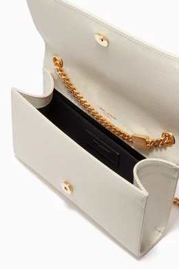 Kate medium bag with leather tassel in grain de shop poudre embossed leather