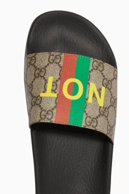Buy Gucci Brown Fake Not Print Slide Sandals in GG Supreme