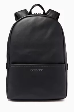 Buy Calvin Klein Black Round Logo Backpack in Faux Leather for Men