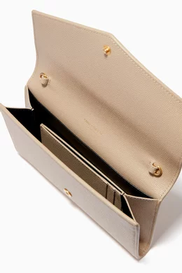 Uptown chain wallet in online grain de poudre embossed leather
