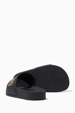 Black and gold moschino slides deals