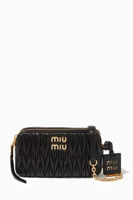 Cross body bags Miu Miu - Logo detailed matelassé leather small bag -  5BD140N88002