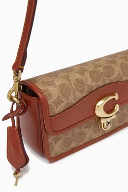 Coach baguette bag price deals