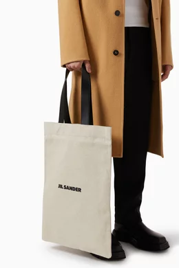 Buy Jil Sander Neutral Book Tote Bag in Canvas for Men in UAE Ounass