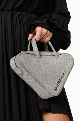 Triangle duffle balenciaga on sale