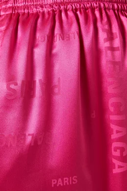 Buy Balenciaga Pink Bal Paris All over Logo Pants in Silk for Women in UAE Ounass