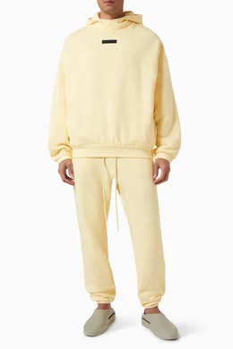 Fear of god top essentials sweatpants yellow