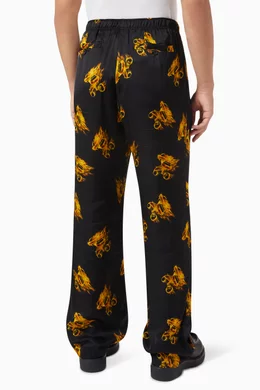 Buy Palm Angels Black Burning Monogram Pants in Viscose for Men in
