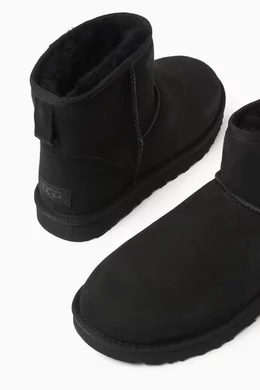 Buy UGG Black Classic Mini II Heritage Ankle Boots in Suede for