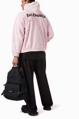 Buy Balenciaga Pink Faded Logo Medium fit Hoodie in Cotton for Men in UAE Ounass