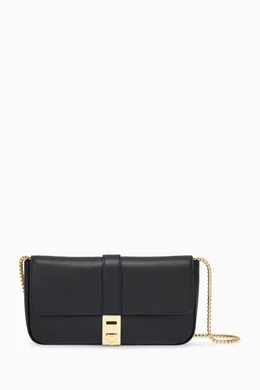 Buy Ferragamo Black Mini Gancini plaque Bag in Leather for