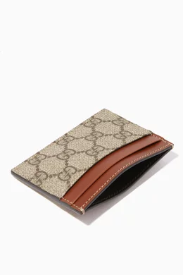 Gucci supreme card holder discount