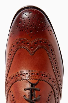 Cole haan kneeland wingtip deals