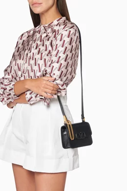 Buy Valentino Garavani Black Valentino Garavani Micro VSLING Shiny Calfskin Shoulder Bag For Women Online Ounass UAE