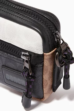 Buy Coach Brown Pacer Slim Pouch in Colourblock Signature Canvas For Men Online Ounass UAE
