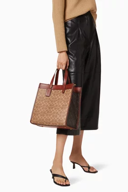 Buy Coach Brown Field Tote in Signature Canvas with Horse Carriage Print For Women Online Ounass UAE