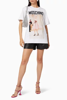 Buy Moschino White Fashion Show Puppet Logo Cotton Oversized T shirt For Women Online Ounass UAE