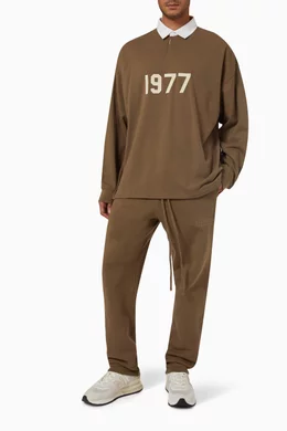 Buy Fear of God Essentials Brown Henley Rugby Polo Shirt in French