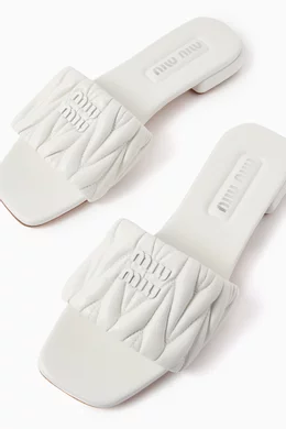 Buy Miu Miu White Ciabatte Logo Slides in Nappa Matelasse For Women Online Ounass UAE