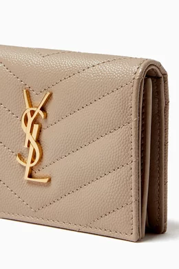 Monogram card case in grain de poudre embossed leather store