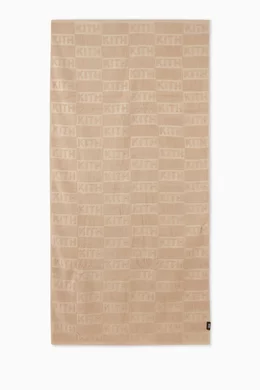 Buy Kith Neutral Logo Embossed Summer Beach Towel in Cotton