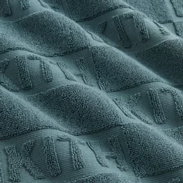 タオル KITH Embossed Summer Beach Towel Buy Kith Green Logo Embossed Summer Beach Towel in Cotton