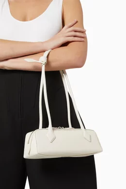 Buy Alaïa White Small Le Teckel Shoulder Bag in Leather For