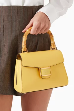 Buy Kate Spade New York Yellow Small Katy Top handle Bag in Leather For Women Online Ounass UAE
