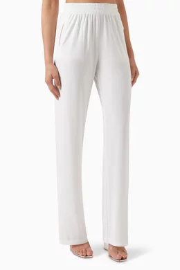 Buy Norma Kamali White Straight leg Sweatpants in Lycra For Women Online Ounass UAE