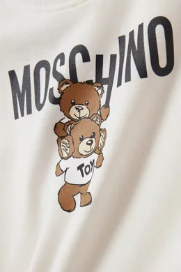 Buy Moschino Neutral Teddy Logo Sweatshirt Dress in Cotton Jersey For Girls Online Ounass UAE
