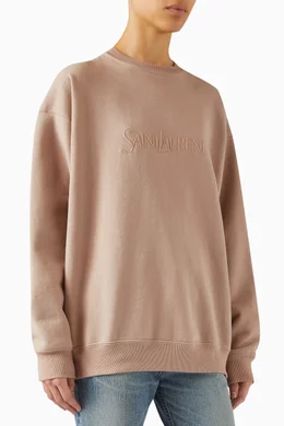 Buy SAINT LAURENT Pink Embossed Logo Sweatshirt in Cotton fleece For Women Online Ounass UAE