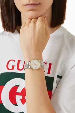 Gucci watch with diamonds top