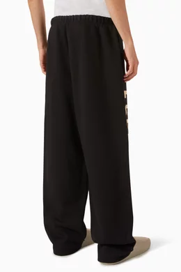 Buy Fear of God Essentials Black Drawstring Relaxed Sweatpants in Fleece For Men Online Ounass UAE