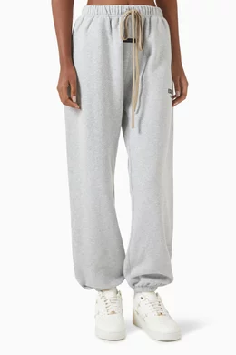 Buy Fear of God Essentials Grey Logo Sweatpants in Fleece For Women Online Ounass UAE