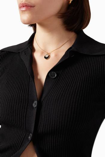 hover state of DY Elements® Small Reversible Pendant Necklace with Pavé Diamonds, Black Onyx & Mother of Pearl in 18kt Yellow Gold 