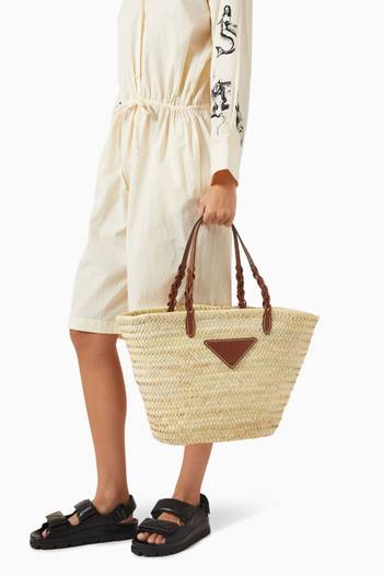 hover state of Triangle Logo Tote Bag in Raffia & Leather