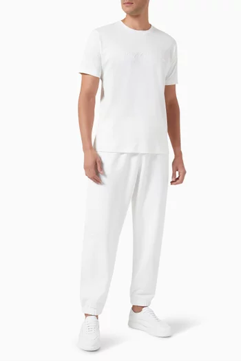 تي شيرت بتطريز شعار الماركة قطن