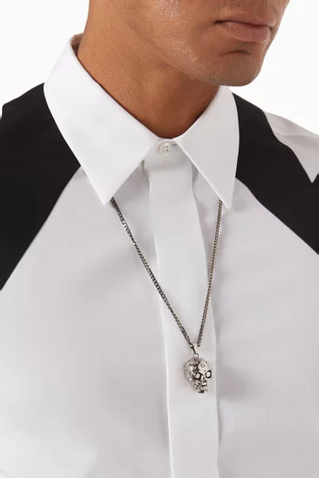 The Knuckle Skull Necklace in Brass