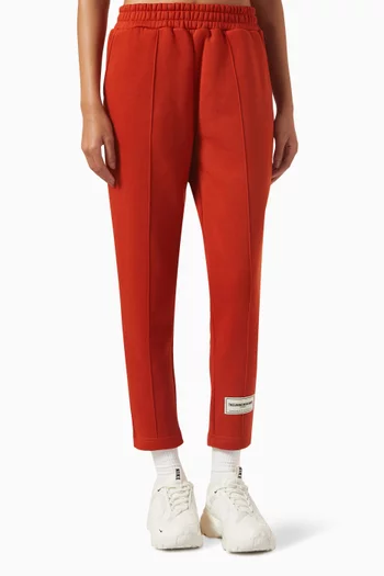 Buy The Giving Movement Orange Tapered Sweatpants in Organic