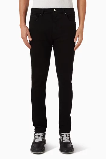 بنطال جينز بقصة سكيني وحلية شعار الماركة دينم