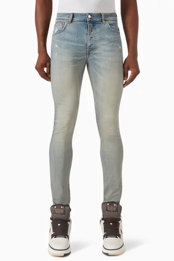 Stack Distressed Skinny Jeans in Denim