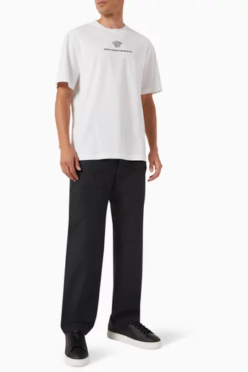 تي شيرت بتطريز شعار الماركة وميدوسا قطن