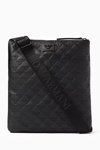 Monogram Embossed Crossbody Bag in Leather